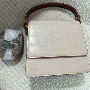 Brand new bag- used only once! Comes with shoulder strap.
